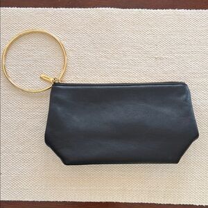 Sleek Black Wristlet with Gold Ring Accent